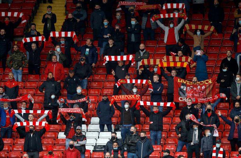 Liverpool fans before the match at Anfield. PA