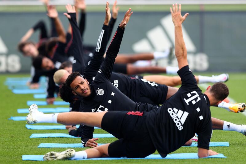 Corentin Tolisso, front left, trains alongside teammates. AP Photo