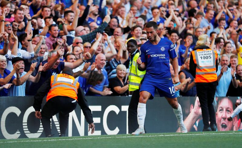 Soccer Football - Premier League - Chelsea v AFC Bournemouth - Stamford Bridge, London, Britain - September 1, 2018  Chelsea's Eden Hazard celebrates scoring their second goal          REUTERS/Eddie Keogh  EDITORIAL USE ONLY. No use with unauthorized audio, video, data, fixture lists, club/league logos or "live" services. Online in-match use limited to 75 images, no video emulation. No use in betting, games or single club/league/player publications.  Please contact your account representative for further details.