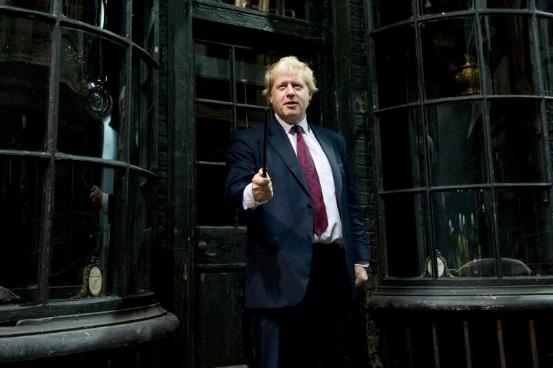 Mr Johnson gestures attends a Harry Potter studio tour of Diagon Alley, at the Warner Brother Studios, London, in December 2011. AP Photo