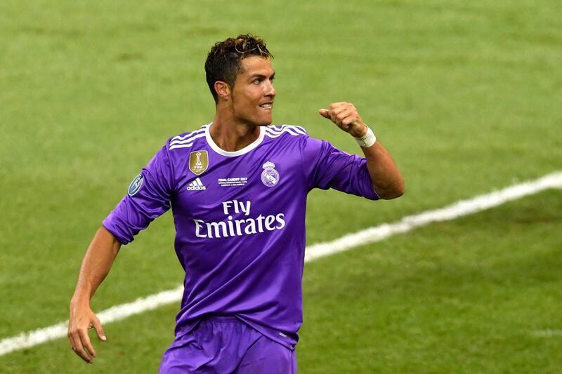 CARDIFF, WALES - JUNE 03:  In this handout image provided by UEFA, Cristiano Ronaldo of Real Madrid celebrates scoring his sides third goal during the UEFA Champions League Final between Juventus and Real Madrid at National Stadium of Wales on June 3, 2017 in Cardiff, Wales.  (Photo by Handout/UEFA via Getty Images)