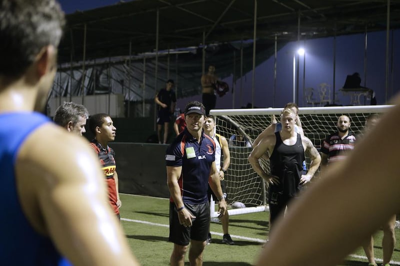 Jebel Ali Dragons head coach Henry Paul gives a talk during training at the Jebel Ali Centre of Excellence. Jeffrey E Biteng / The National