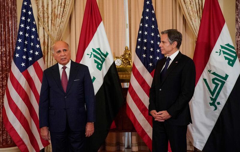 US Secretary of State Antony Blinken and Iraqi Foreign Minister Fuad Hussein speak to the press at the State Department. AFP