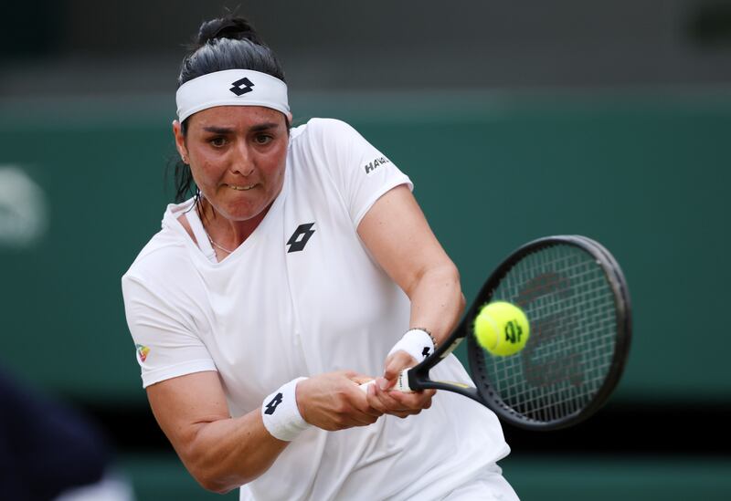 Ons Jabeur of Tunisia plays a backhand against Elise Mertens of Belgium. Getty