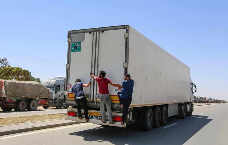 Stranded Libyan drivers are also trying to return to their country. AFP