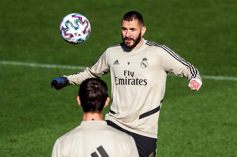 Real Madrid striker Karim Benzema takes part in a training session. EPA