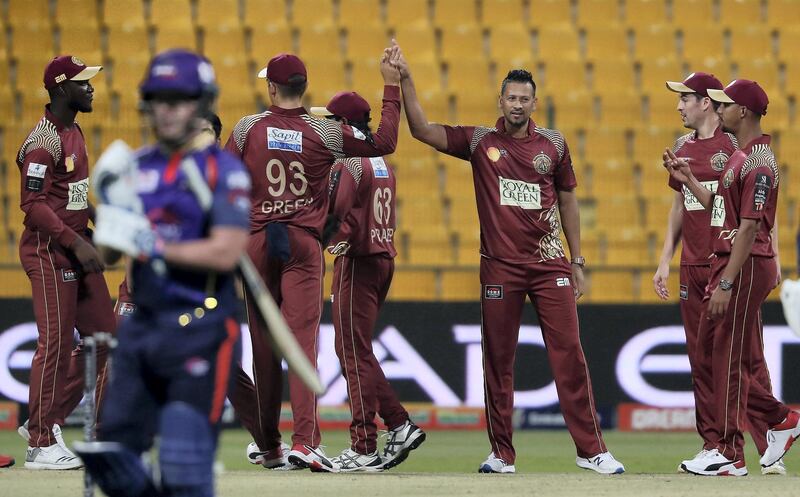 ABU DHABI , UNITED ARAB EMIRATES , Nov 20 – 2019 :-  Rayad Emrit (center) of Northern Warriors celebrating after taking the wicket of Tom Moores during the Abu Dhabi T10 Cricket match between Bangla Tigers vs Northern Warriors at Sheikh Zayed Cricket Stadium in Abu Dhabi. ( Pawan Singh / The National )  For Sports. Story by Paul