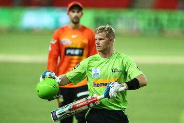 GOLD COAST, AUSTRALIA - JANUARY 06: Sam Billings of the Thunder celebrates winning the Men's Big Bash League match between the Perth Scorchers and the Sydney Thunder at Metricon Stadium, on January 06, 2022, in Gold Coast, Australia. (Photo by Chris Hyde / Getty Images)