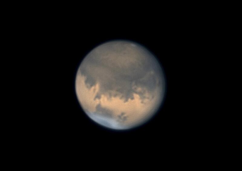 An image of Mars centred on the Chryse basin. Solis Lacus is seen towards the right limb, with the southern polar cap and much larger northern polar hood also visible. Jamie Cooper / Getty Images