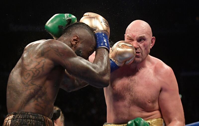 Deontay Wilder connects with Tyson Fury. AP Photo