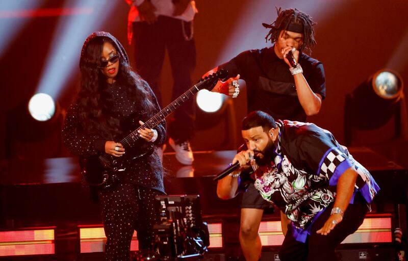 DJ Khaled, HER and Lil Baby perform during the BET Awards. Reuters