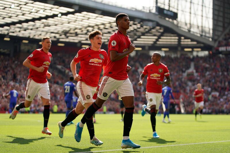 Manchester United's Marcus Rashford celebrates after scoring from the spot against Leicester. AFP