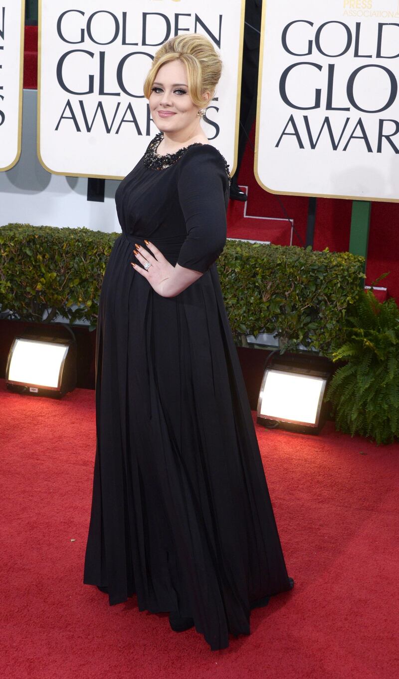 epa03534434 British singer Adele arrives for the 70th annual Golden Globe Awards held at the Beverly Hilton Hotel in Beverly Hills, Los Angeles, California, USA, 13 January 2013.  EPA/PAUL BUCK