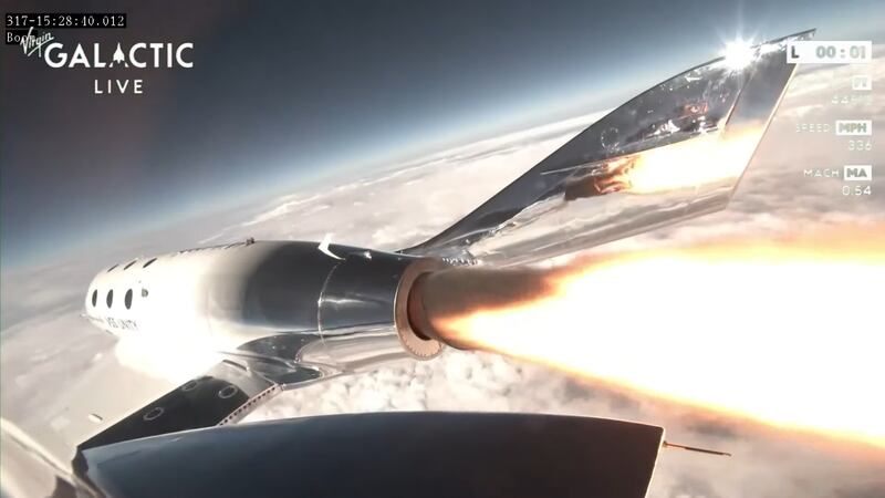 Virgin Galactic's VSS Unity spaceplane blasts its engines shortly after separating from the mothership on Thursday. It carried three Italian passengers and three crew members to the edge of space. All photos: Virgin Galactic 