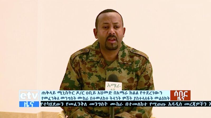 In this image made from video, Ethiopia's Prime Minister Abiy Ahmed announces a failed coup as he addresses the public on television, Sunday, June 23, 2019. The failed coup in the Amhara region was led by a high-ranking military official and others within the countryâ€™s military, the prime minister told the state broadcaster. (ETV via AP)