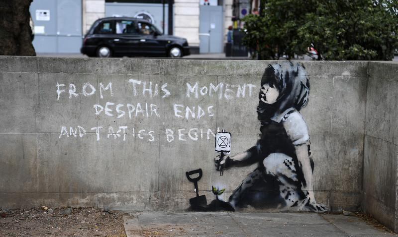 epa07529993 A wall art reported to be a new Banksy artwork in Marble Arch in London, Britain, 26 April 2019. The new wall art is at the site of the Extinction Rebellion camp at Marble Arch where climate change demonstrators protested for more than a week in London.  EPA-EFE/ANDY RAIN