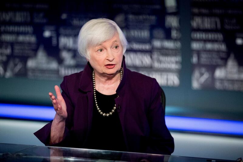 FILE - In this Aug. 14, 2019, file photo former Fed Chair Janet Yellen speaks with FOX Business Network guest anchor Jon Hilsenrath in the Fox Washington bureau in Washington. Yellen said Wednesday, March 24, 2021,  that the U.S. government has more room to borrow, but also said higher taxes would likely be required in the long run to finance future spending increases.  (AP Photo/Andrew Harnik, File)