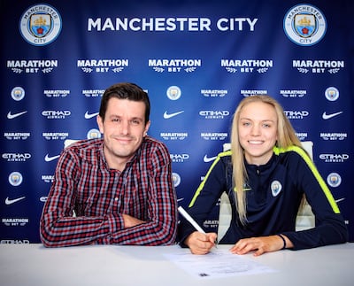 Gavin Makel, left, with Manchester City's Esme Morgan. Photo: Manchester City FC