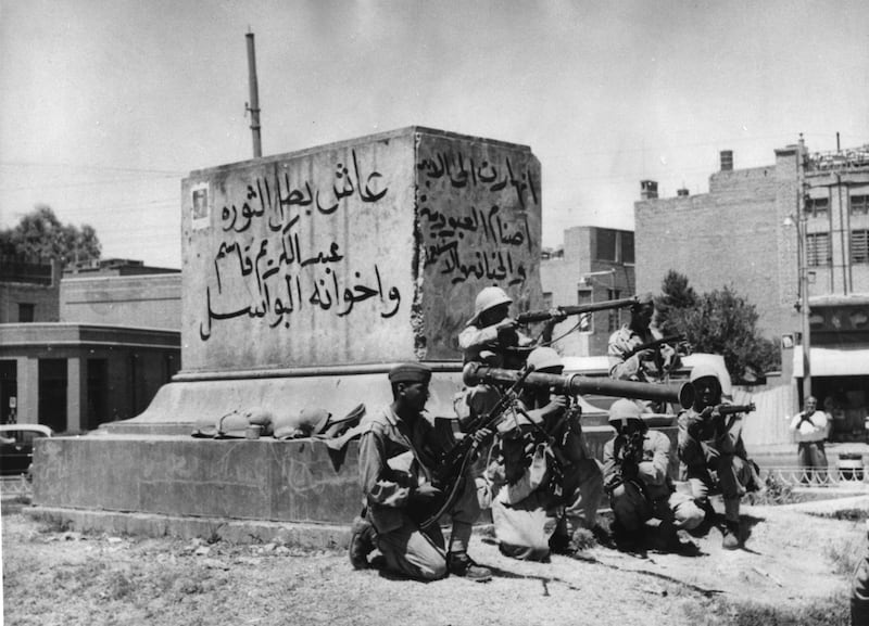 Heavily armed revolutionary soldiers on a street of Baghdad, on July 14, 1958, a few hours after the military staged a coup to take control of the country and overthrow the monarchy, declaring a republic. King Faisal II and Crown Prince Abdullah were shot dead in his palace at the height of the coup. AP