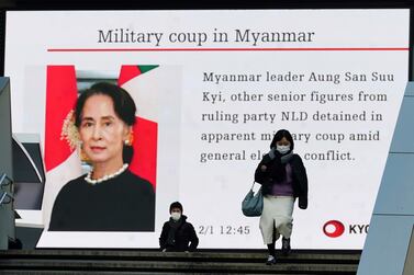 A screen showing the news on the Myanmar situation on Monday in Tokyo. AP Photo