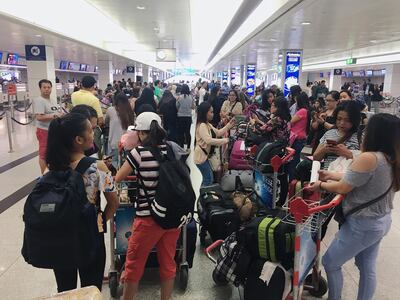 DUBAI, UNITED ARAB EMIRATES - AUGUST 14, 2018. 

Today, a total of 101 Filipino nationals will fly out of Dubai via Philippine Airlines.

The Philippine Consulate has booked a one-way tickets (DXB-MNL) for the returning Filipinos. "Out of the 152 amnesty-seekers, 101 were given free tickets. The rest were not aware that we are providing them with free tickets. Some of them had their tickets booked a month before. Unfortunately, we cannot refund the fare due to restrictions in the Philippine government auditing rules," Cortes said.


(Photo by Reem Mohammed/The National)

Reporter: Patrick Ryan
Section:  NA