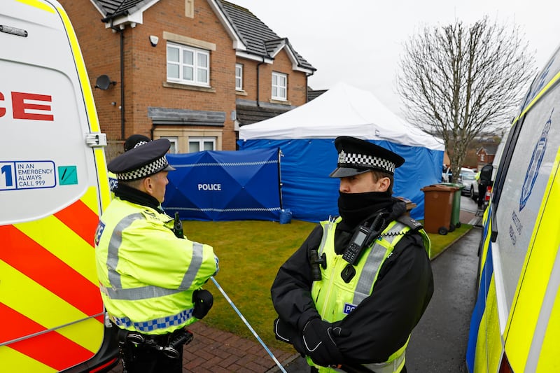 Police officers at the home of Mr Murrell and Ms Sturgeon in Glasgow. Getty