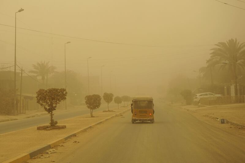 Traffic was light because of the poor visibility. AFP