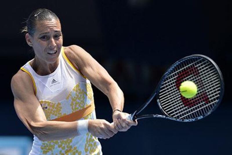 Flavia Pennetta won a hard-fought match 6-1, 4-6, 7-5 in one hour 52 minutes. April Fonti / EPA