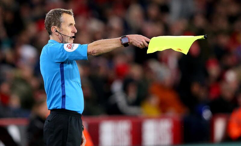 SHEFFIELD, ENGLAND - DECEMBER 05: Linesman Derek Eaton is overruled by VAR during the Premier League match between Sheffield United and Newcastle United at Bramall Lane on December 05, 2019 in Sheffield, United Kingdom. (Photo by Alex Livesey/Getty Images)