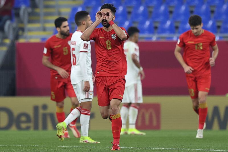 Syria's midfielder Ward Al Salama celebrates after scoring. AFP