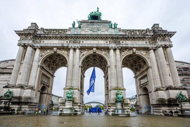 The Nato flag flies under the Cinquantenaire Arch in Brussels, Belgium. EPA