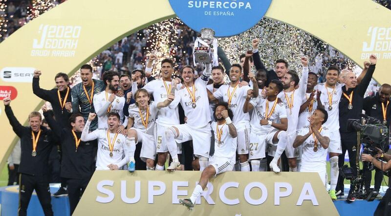 Real Madrid players celebrate after winning  the Spanish Super Cup final. EPA