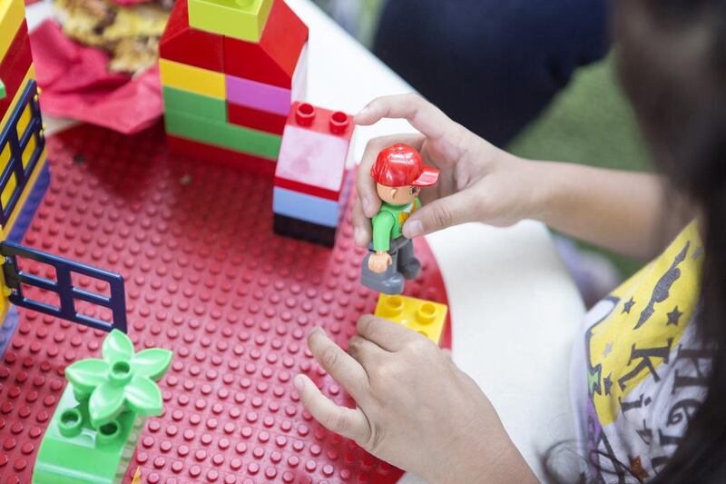 A girl plays at Dubai Parks and Resorts’ Legoland event, where they announced the launch of their annual passes. Reem Mohammed / The National