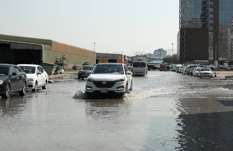 Water flooding the streets due to recent rain in Sharjah. Pawan Singh / The National