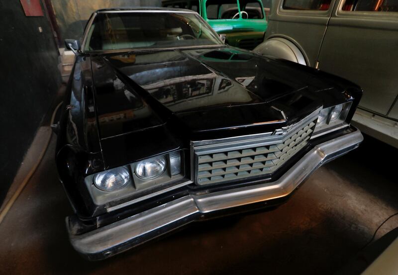 A black 1975 Chevrolet Impala, a presidential car of late Egyptian president Anwar El Sadat, is seen in the store of Sayed Sima. Reuters