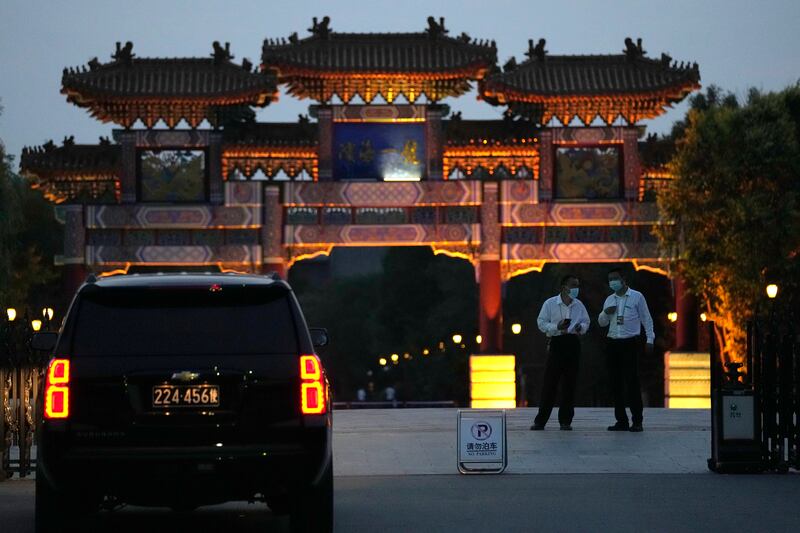 A US embassy car outside a hotel in Tianjin, where US and Chinese officials were expected to held talks. AP