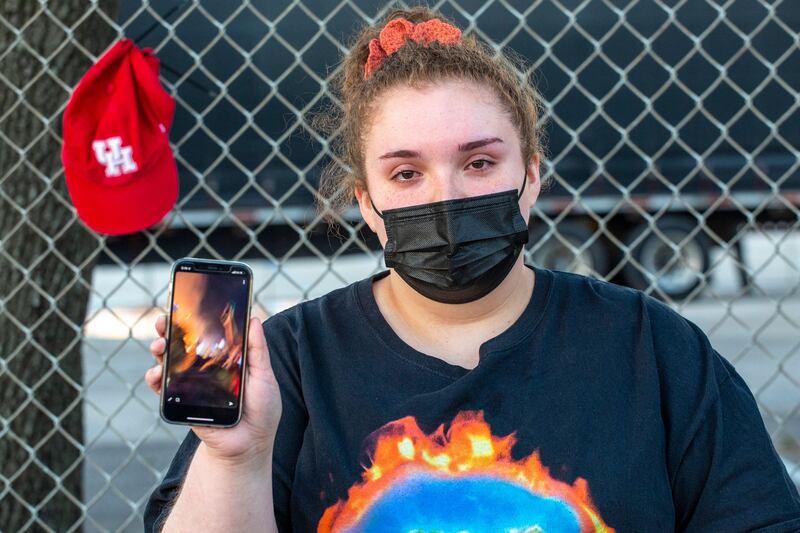 Bryanna Morales, 17, shows a video of the crowd surge that killed eight at the festival. She says the medical staff were not properly trained.  "I was taken into the medical tent because I was having a hard time breathing and all they did was hand me a bottle of water and told me to sit in the corner." AFP