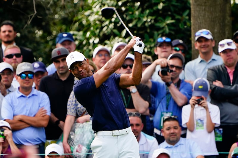 Tiger Woods tees off on the seventh hole during a practice round for The Masters. AP