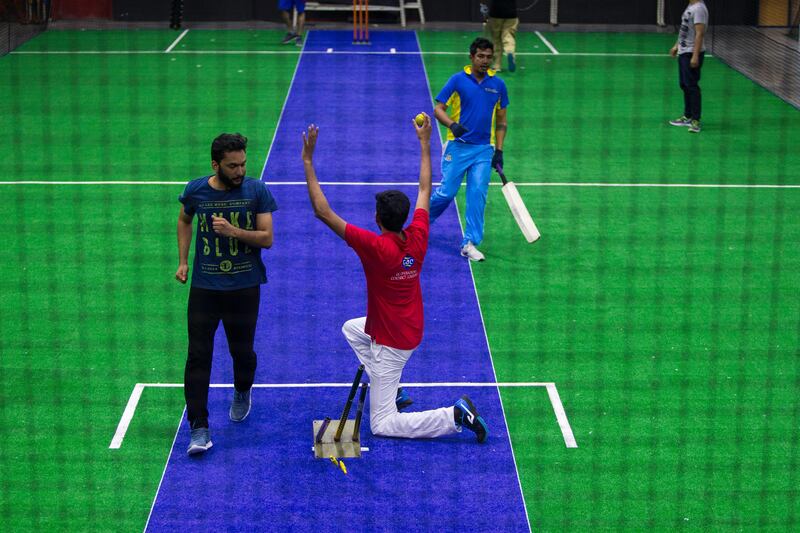 Dubai, United Arab Emirates, July 18, 2017:    A group of men play pick-up indoor cricket at the Insportz Club in the Al Quoz area of Dubai on July 18, 2017. Christopher Pike / The National

Reporter: Paul Radley
Section: Sport