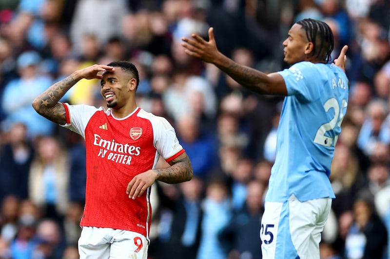 Manchester City's Manuel Akanji remonstrates alongside Arsenal's Gabriel Jesus . Reuters