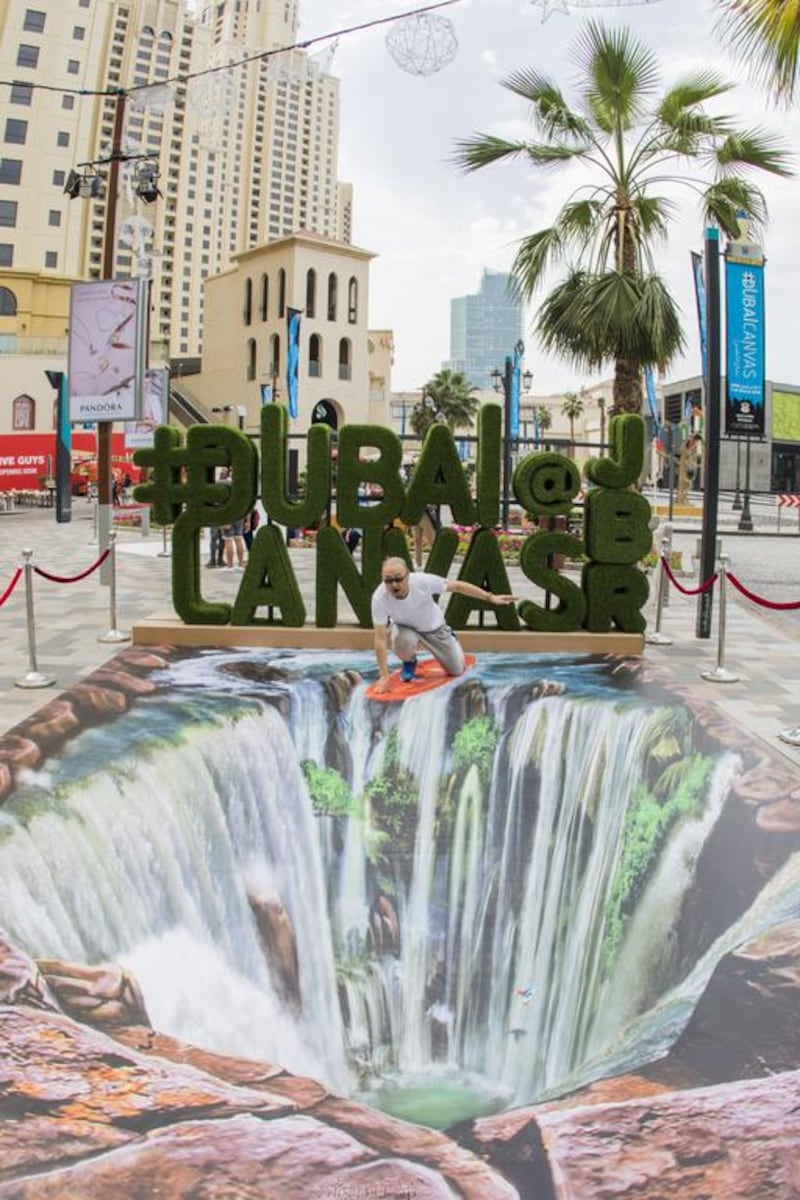 Surfing over a 3-D painted waterfall. Courtesy Dubai Media Office