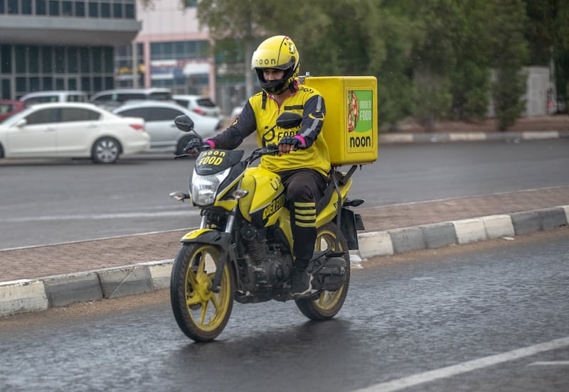 Rain fell in Abu Dhabi as unsettled summer weather continued across the country. Victor Besa / The National