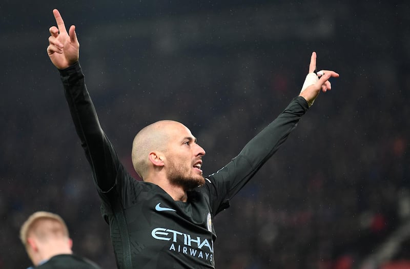 STOKE ON TRENT, ENGLAND - MARCH 12:  David Silva of Manchester City celebrates as he scores their second goal during the Premier League match between Stoke City and Manchester City at Bet365 Stadium on March 12, 2018 in Stoke on Trent, England.  (Photo by Michael Regan/Getty Images)