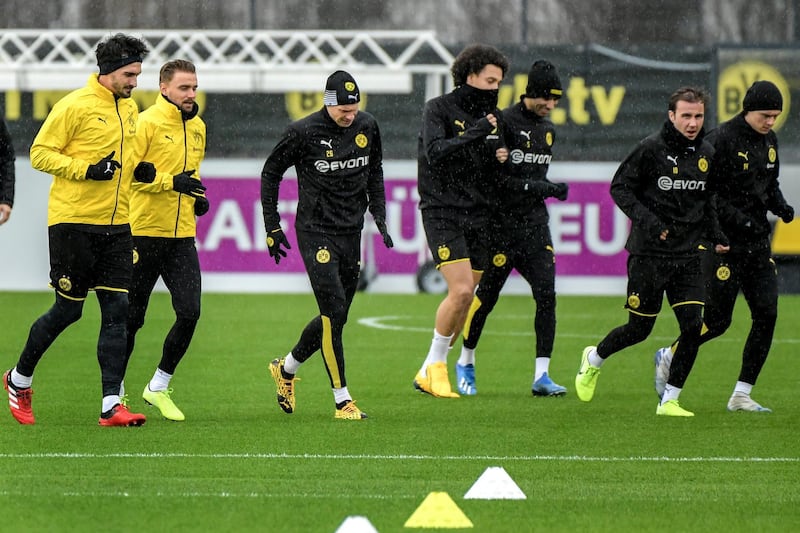 Dortmund's Mats Hummels, Marcel Schmelzer, Lukasz Piszczek, Axel Witsel, Achraf Hakimi, Mario Goetze and Nico Schulz take part in a training drill. EPA