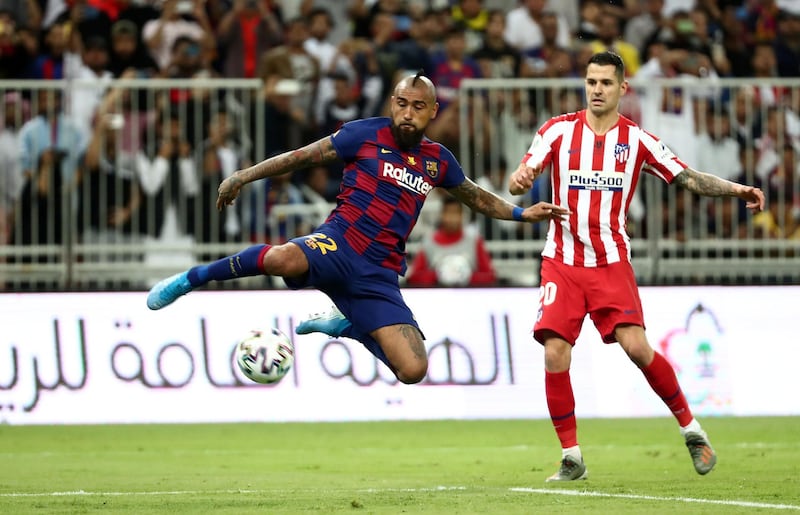 Barcelona's Arturo Vidal, left. Reuters