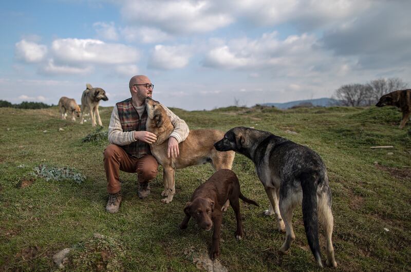 The kind-hearted entrepreneur says the animals he takes in are like his children. EPA 