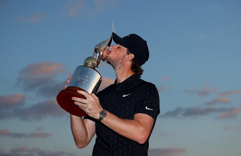 Thomas Pieters with the Falcon Trophy after his victory at Yas Links in 2022. Getty 
