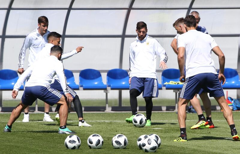 Lionel Messi, centre, takes part in training. Gabriel Rossi / Getty Images