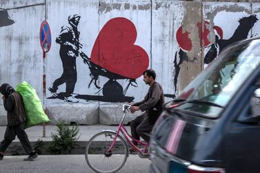 Street art and murals have popped up around Kabul in the last decade, often painted and sprayed on blast walls that are put up for protection. Stefanie Glinski for The National