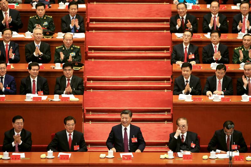 Chairman of the standing committee of the National People's Congress Zhang Dejiang, former Chinese president Hu Jintao, Chinese president Xi Jinping, former president Jiang Zemin, and Chinese premier Li Keqiang. Aly Song / Reuters